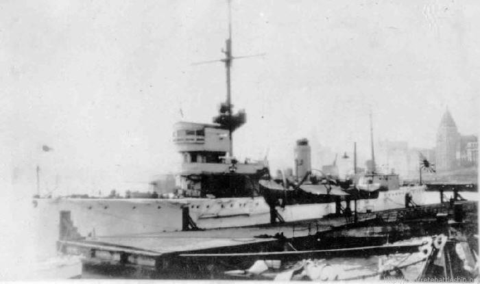 This sneaked in - it's a Japanese gunboat berthed in Shanghai opposite the Cathay Hotel