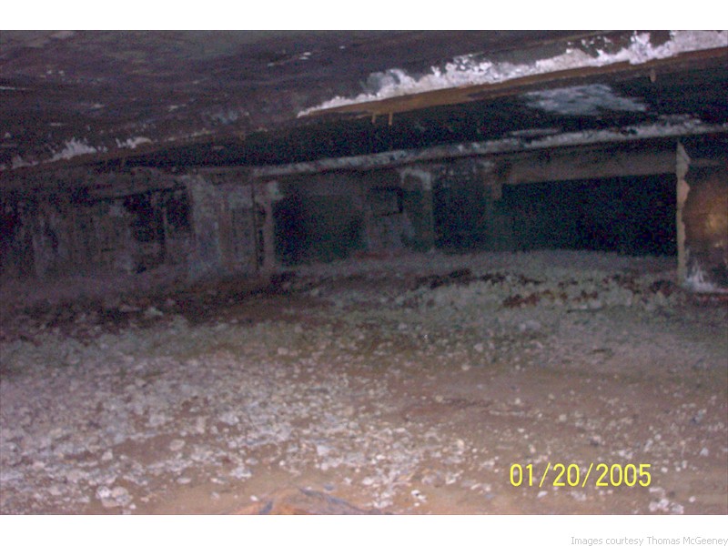 Difficult to capture with the flash on a small camera, this entire area has been stripped of the supports for its roof. 