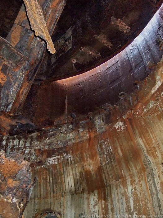 Battery Marshall - Looking up at the revolving part of the turret. The breech of the port side 14 inch barrel is at the rear of the turret.