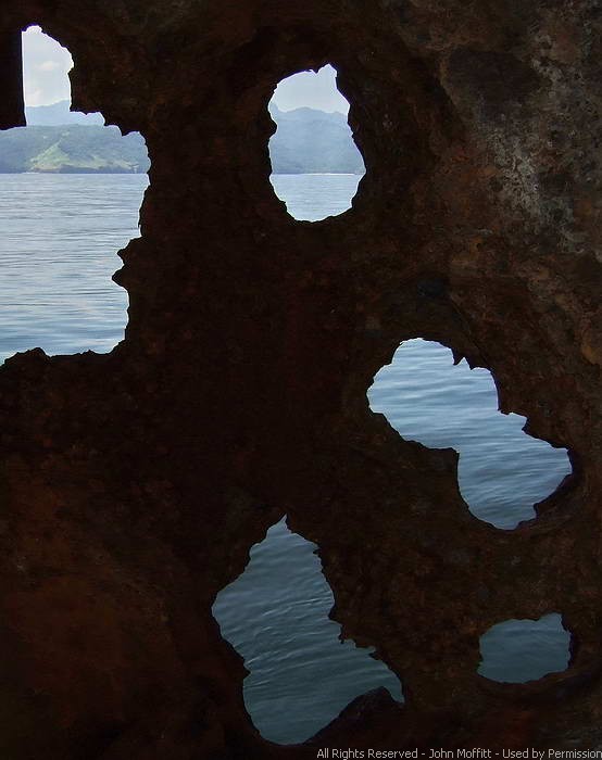 Battery Roberts - looking out shell holes in the outside wall.