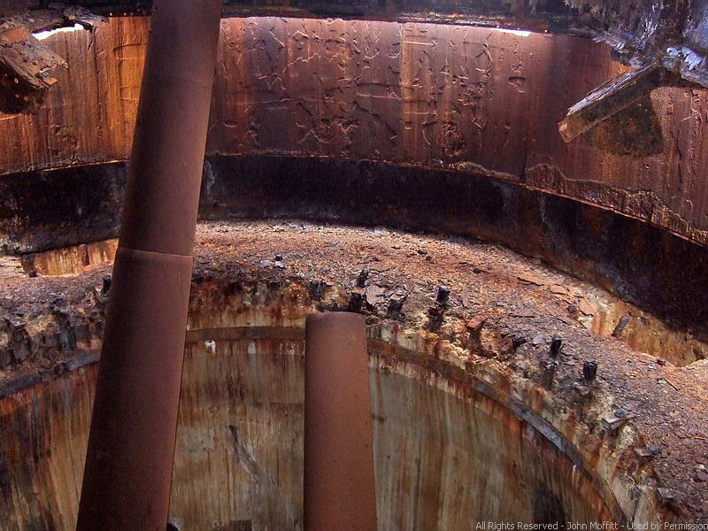 Battery Wilson - inside the turret looking down at both 14 inch gun barrels. ( Out of sight is out of mind, and both are an invitation for scrapping to continue _ ExO.) 