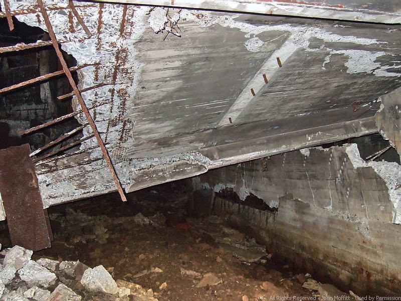 Collapsed floors on this level. These walls have been destroyed relatively recently.