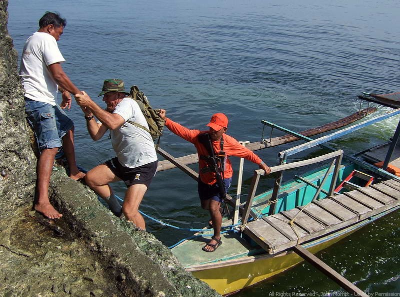 Karl Welteke comes aboard. There is no easy way to get on Fort Drum. A calm Manila Bay is essential. 